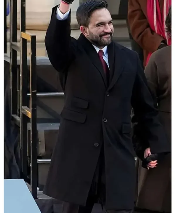 Zohran Mamdani wearing a wool coat front view at inauguration ceremony