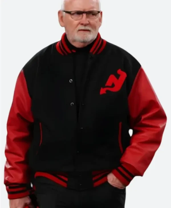 Lindy Ruff wearing a varsity jacket front view