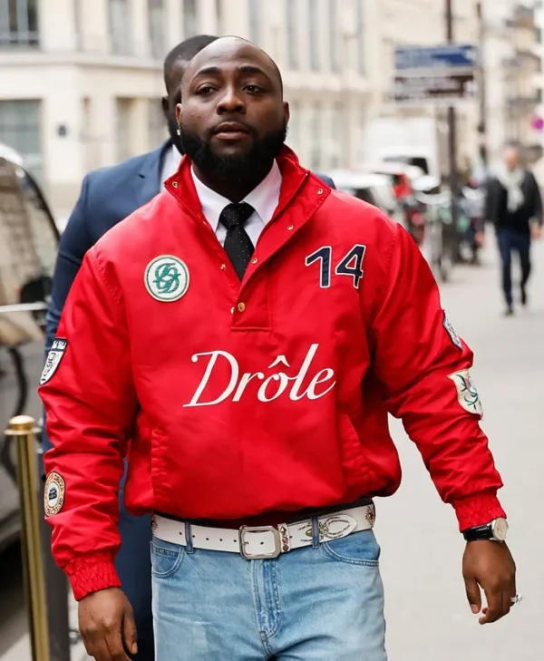 Davido wearing a red jacket front view at Paris Fashion Week 2026