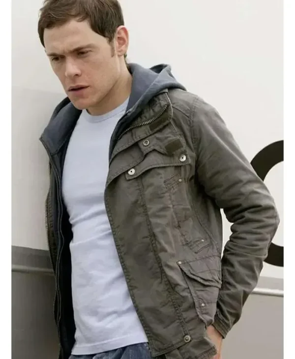 Owen Harper wearing a grey jacket front view in Torchwood