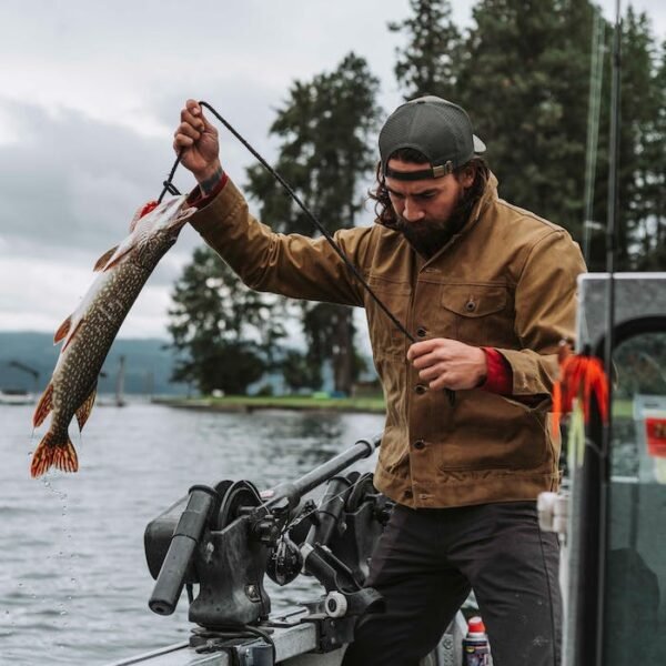 Front view of the brown Filson Tin Cloth jacket with shirt-style collar.