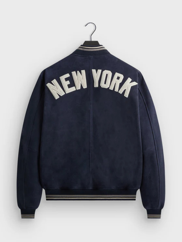 Third angled view of the custom-made Kith New York Yankees suede bomber jacket on a pure white background.